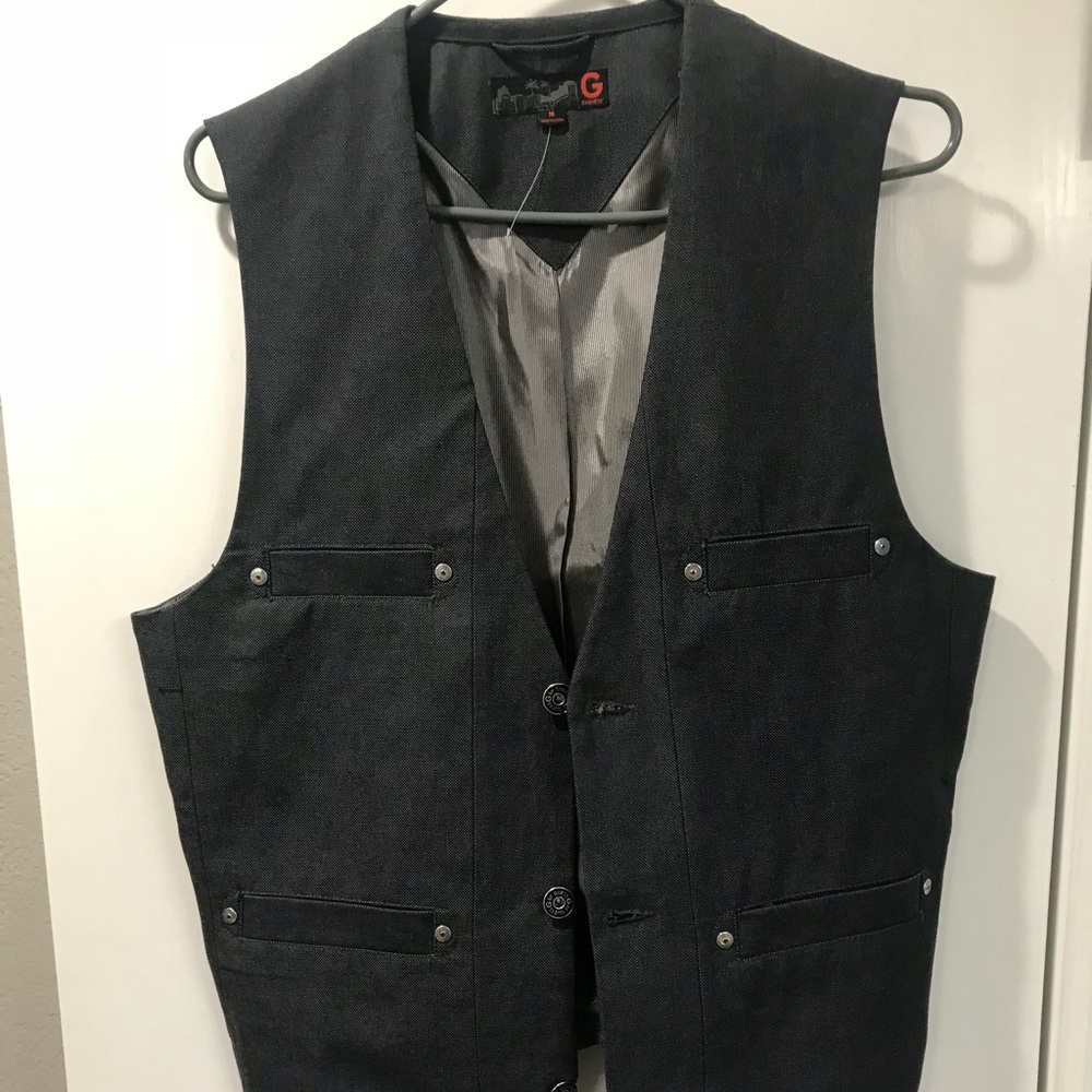 G by Guess vest. The vest size is medium in men’s